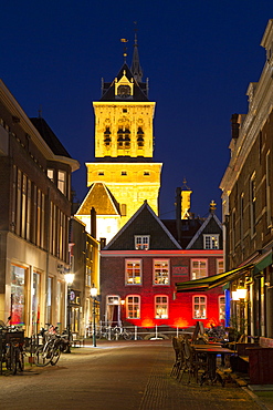 The tower of Delft Town Hall (Stadhuis) and Dutch Gold Age facades in Delft, South Holland, The Netherlands, Europe