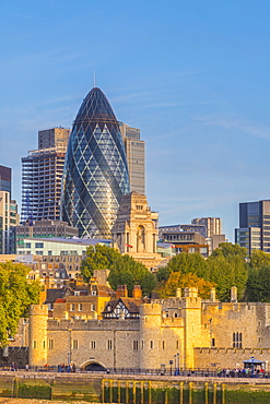 Tower of London, UNESCO World Heritage Site, and the Gherkin (30 St. Mary Axe), City of London, London, England, United Kingdom, Europe