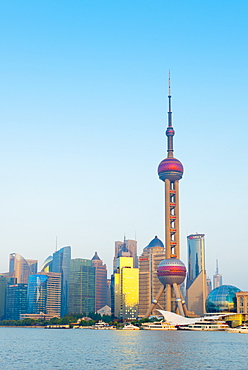 Skyline of Pudong Financial District including Oriental Pearl Tower, across Huangpu River, Shanghai, China, Asia 