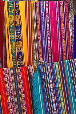 Colourful indigenous-style textiles on sale in the provincial capital, Riobamba, Chimborazo Province, Central Highlands, Ecuador, South America