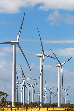 A group of 30 wind turbines by Lake Nicaragua, Nicaragua's first such facility name Amayo) with Concepcion Volcano beyond, Rivas, Nicaragua, Central America