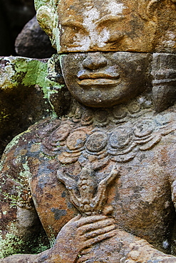 A carved dvarapala entrance guardian stone at the 12th century Preah Khan (Prah Khan) Buddhist temple complex, Angkor, UNESCO World Heritage Site, Siem Reap, Cambodia, Indochina, Southeast Asia, Asia