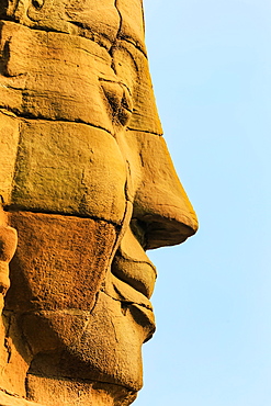 One of 216 smiling sandstone faces at 12th century Bayon, King Jayavarman VII's last temple in Angkor Thom, Angkor, UNESCO World Heritage Site, Siem Reap, Cambodia, Indochina, Southeast Asia, Asia