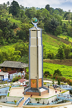 The world peace themed tower at this tourist park with worship houses of five major religions and volcanic fumarole fields, Bukit Kasih, Minahasa, North Sulawesi, Indonesia, Southeast Asia, Asia