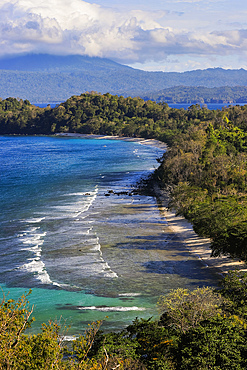 View south to Paal Beach and Tangkoko Nature Reserve beyond from Pulisan Resort and beach below, Pulisan, Minahasa Highlands, North Sulawesi, Indonesia, Southeast Asia, Asia