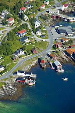 View on Reine with road houses and boats from above Moskenesoya Lofoten Norway