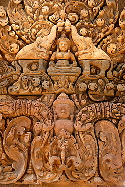 Stone relief god Indra with elephants temple Banteay Srei Angkor Siem Reap Cambodia