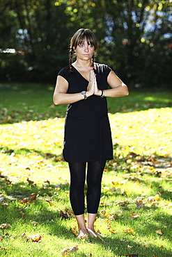 Woman doing Yoga exercises