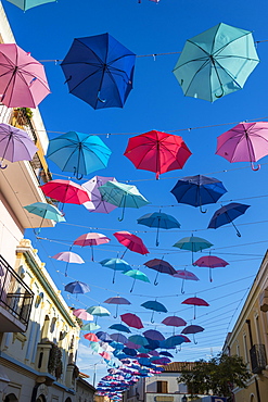 Umbrellas Street in Pula, Sardinia, Italy, Europe