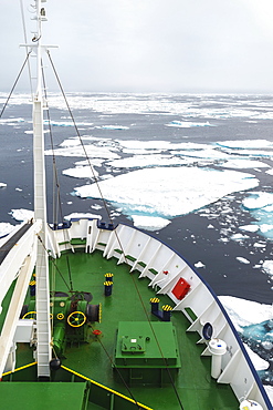 Expedition Boat navigating through melting pack ice, Arctic Ocean, 81° North and 26° East, Svalbard Archipelago, Norway, Europe