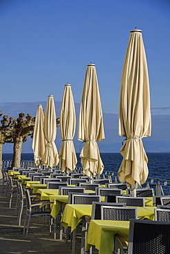 Parasols at lakeside Meersburg, Baden-Wuerttemberg, Germany, Europe