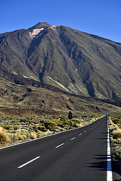 Street TF21 through volcanic landscape with volcano Teide, Teide National Park, Tenerife, Canary Islands, Spain, Europe