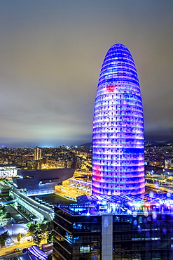 City view with illuminated Agbar Tower at night, Barcelona, Catalonia, Spain, Europe