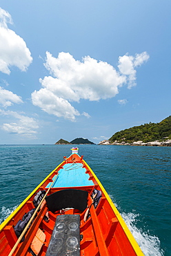 Bow of a moving longtail boat in the turquoise sea, island of Koh Tao, Gulf of Thailand, Thailand, Asia