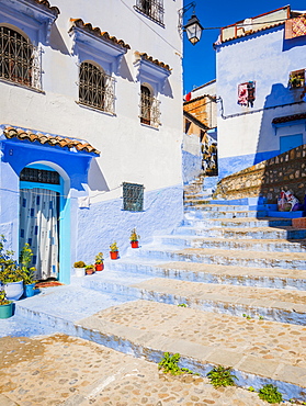 Stairs through narrow alley, blue houses, medina of Chefchaouen, Chaouen, Tanger-Tétouan, Morocco, Africa