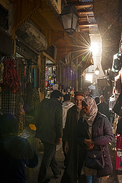 Locals, Narrow streets in an Arab market, Shouk, Fez Medina, Fes, Morocco, Africa