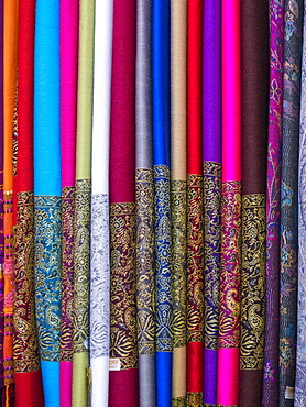 Colourful fabrics with decorative patterns on sale at a market in the Medina, Marrakech, Marrakech-Tensift-Al Haouz, Morocco, Africa