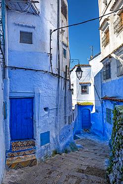 Stairs through narrow alley, blue houses, medina of Chefchaouen, Chaouen, Tanger-Tetouan, Morocco, Africa