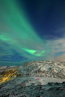 Northern Lights (aurora borealis), mountain landscape, winter landscape with view to the pass road on Jamnfjellet, Tromsoe, Norway, Europe