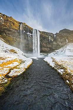 Waterfall Seljalandsfoss in winter, Suourland, South Iceland, Iceland, Europe