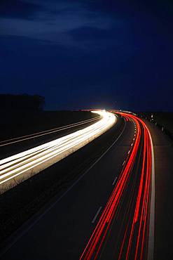 Light tracks on the A14 motorway at night, near Halle an der Saale, Saxony-Anhalt, Germany, Europe