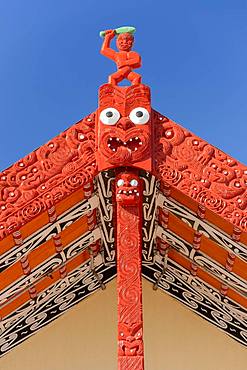 Wooden gable with traditional carving, House of Maori, Whakarewarewa, Rotorua, Bay of Plenty, North Island, New Zealand, Oceania