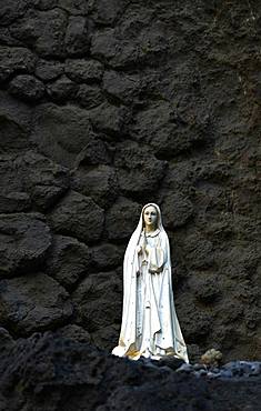 Madonna figure in volcanic rock, Ribeira de Janela, also Ribeira da Janela, Porto Moniz, Island Madeira, Portugal, Europe