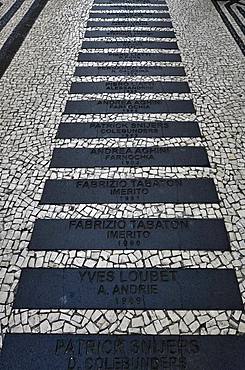 Walk of Fame with the names of famous rally drivers of the Madeira Wine Rally, black and white ornamental floor mosaic made of cobblestones, Funchal, Madeira Island, Portugal, Europe