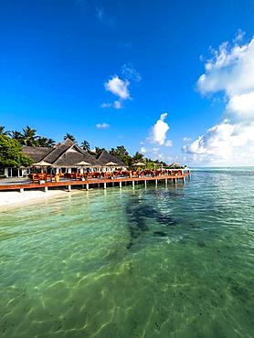 Tourist Resort, Bungalows between palm trees, Maldives Island, South Male Atoll, Maldives, Asia