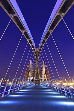 The Lowry bridge during blue hour, Salford Quays, Manchester, England, United Kingdom, Europe