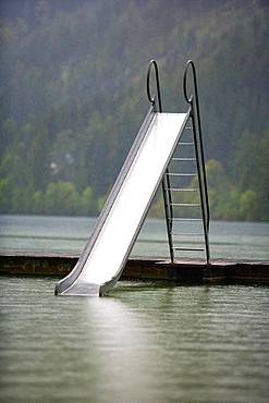 Rainy weather, water slide at the Erlaufsee near Mariazell, Styria, Austria, Europe