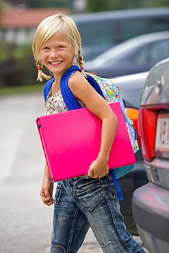 Girls on their way to school in road traffic, Upper Austria, Austria, Europe