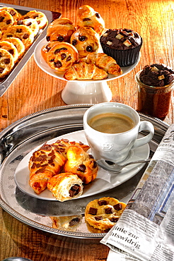 Breakfast, coffee break, pastries, croissants and muffins, coffee and newspaper, Germany, Europe