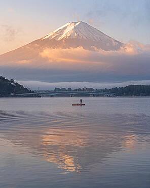 Single fisherman on Lake Kawaguchiko, Japan, Asia