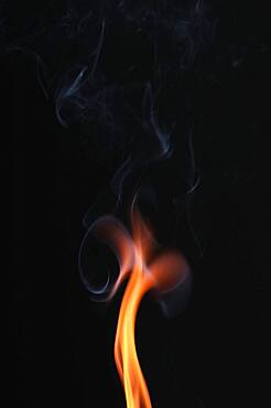 Smoke from a burnt match against a dark background, studio recording, Germany, Europe