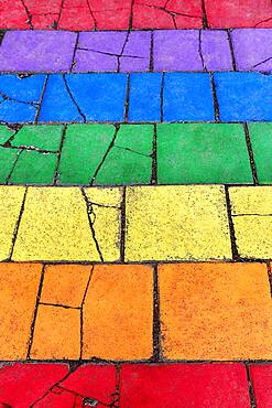 Colorful painted stone slabs, pavement in the colors of the rainbow, background picture, Seyoisfjoerour, Seydisfjoerdur, East Iceland, Iceland, Europe