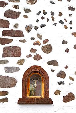 Martyrdom on a house wall in the mountain village Masca, Masca gorge, Teno Mountains, Tenerife, Canary Islands, Spain, Europe