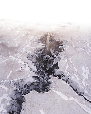 Aerial view, Fjaorargljufur Canyon with golden light and clouds, Kirkjubaejarklaustur, Iceland, Europe