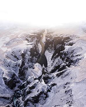 Aerial view, Fjaorargljufur Canyon with golden light and clouds, Kirkjubaejarklaustur, Iceland, Europe