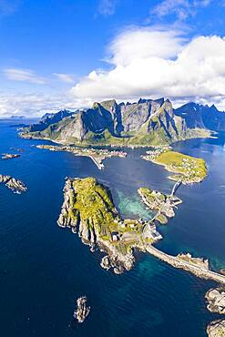 View of islands, fjord and mountains, fishing villages Sakrisoy and Reine, Reinefjord, Lofoten, Norway, Europe