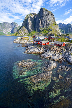 Rorbuer, typical wooden houses, Hamnoy, Reinefjord with mountains, Moskenes, Moskenesoey, Lofoten, Norway, Europe