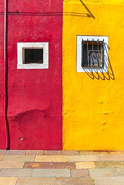 Red and yellow wall with window, colorful house wall, colorful facade, Burano Island, Venice, Veneto, Italy, Europe