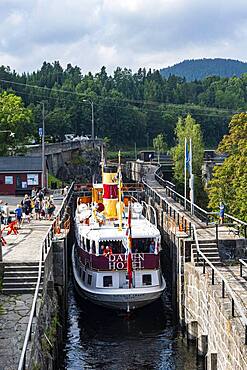 Tourist boat in the Ulefoss locks, Telemark Canal, Norway, Europe