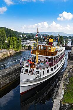 Tourist boat in the Ulefoss locks, Telemark Canal, Norway, Europe