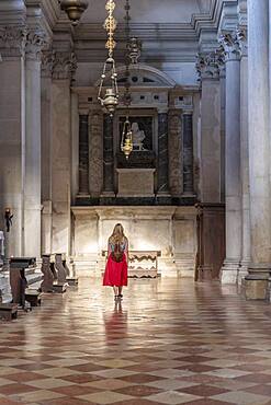 Young woman with dress in San Giorgio Maggiore church, Venice, Veneto, Italy, Europe