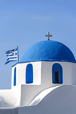 Blue and White Greek Orthodox Church Agios Nikolaos with Greek Flag, Parikia, Paros, Cyclades, Aegean Sea, Greece, Europe