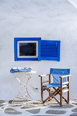 Cycladic house, Blue window and blue chair, Paros, Cyclades, Greece, Europe