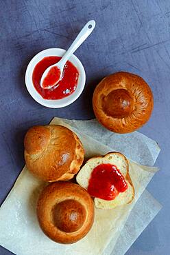 Brioche, brioches and small bowls with jam, Germany, Europe