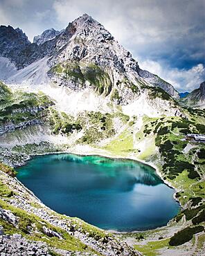 Blue lake with mountains, Drachensee near Ehrwald, Tyrol, Austria, Europe