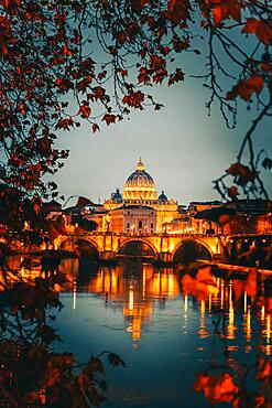View of the illuminated Vatican over the river Tieber, Rome Italy